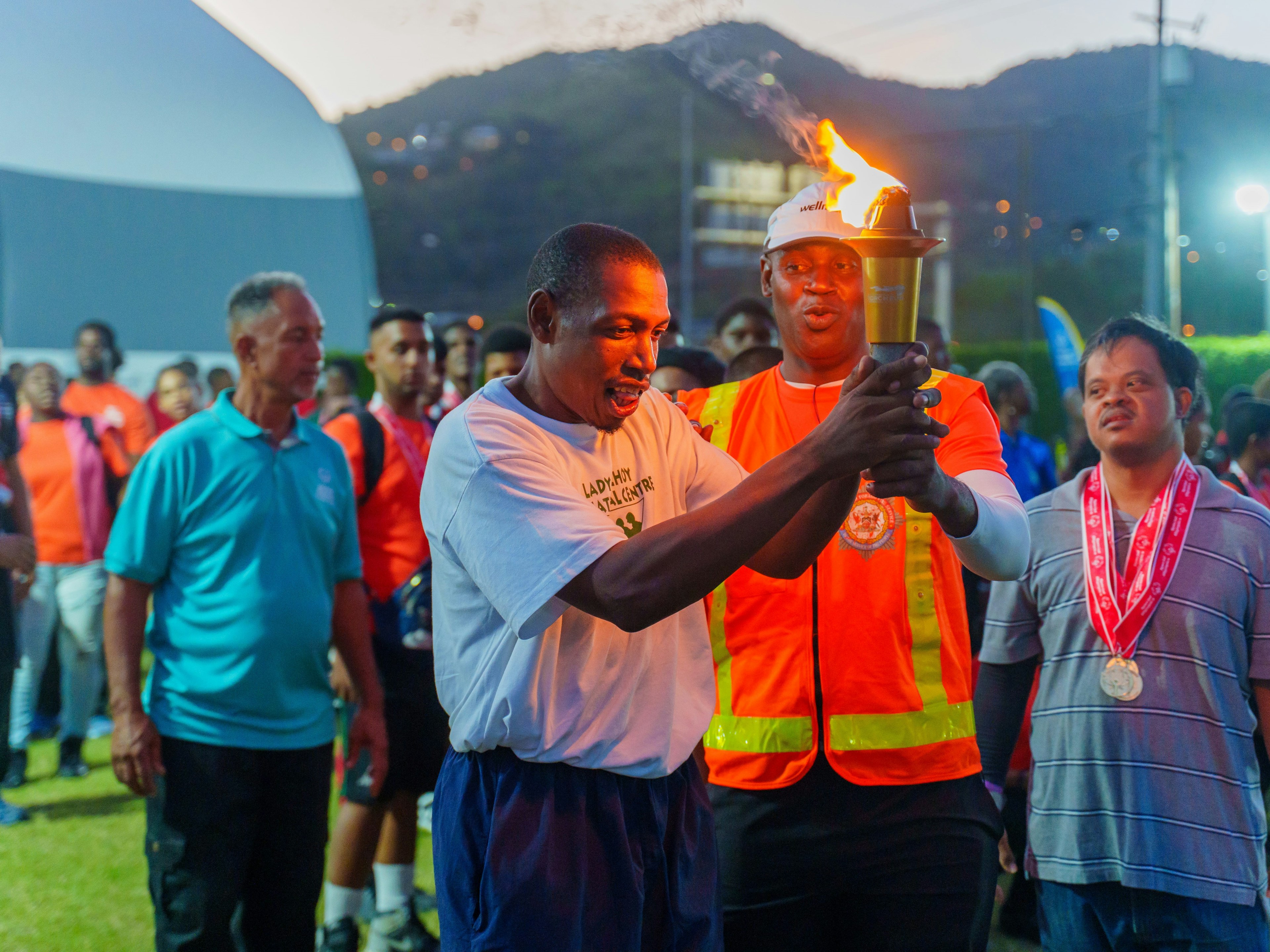 SOTT athlete holding the torch