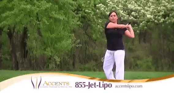 woman playing golf