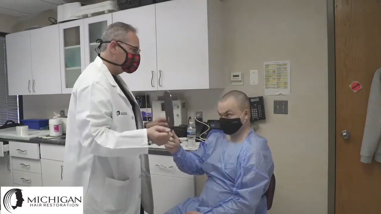 Dr. Berkowitz doing neograft on patient