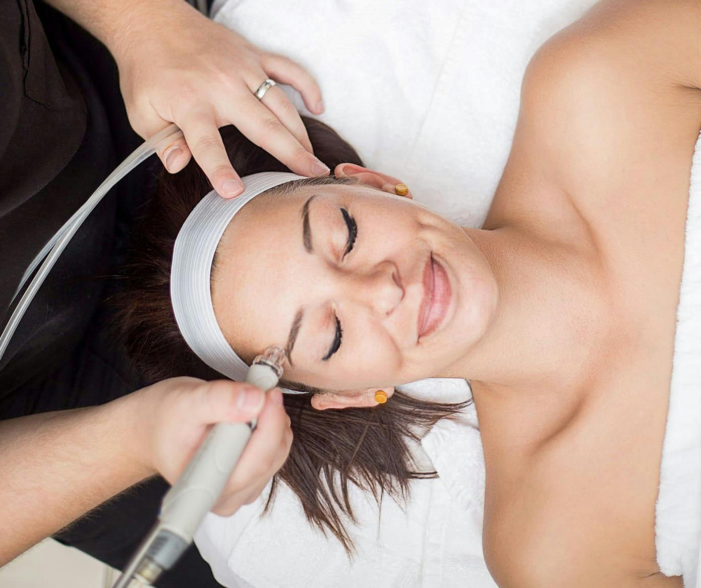 woman getting facial procedure done