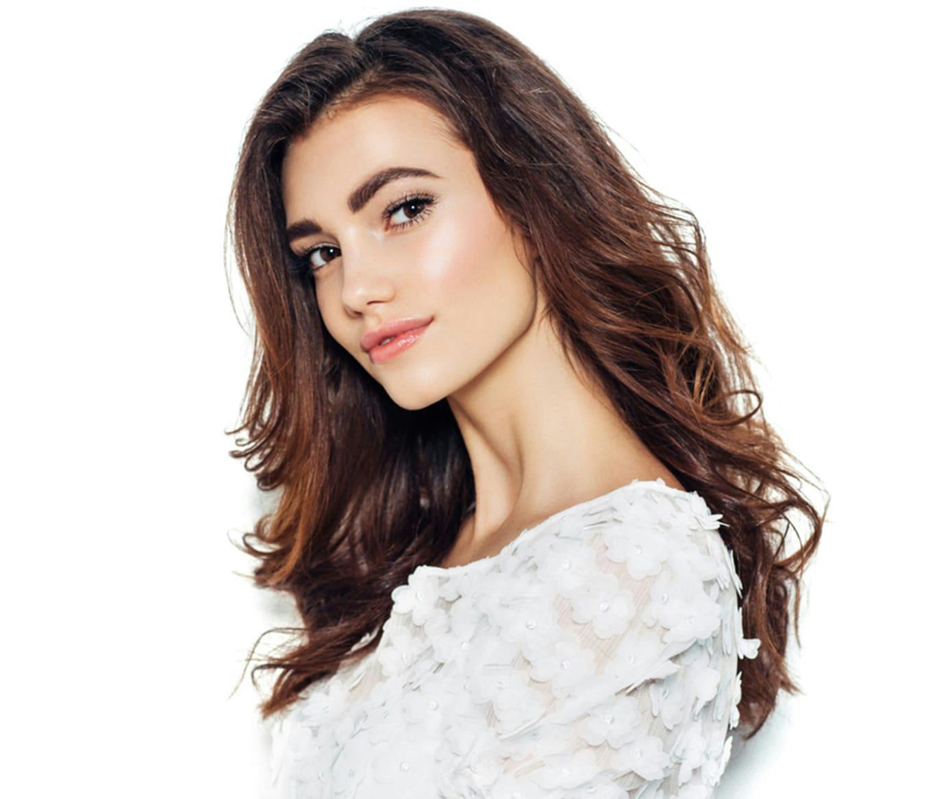 woman in white flowery shirt