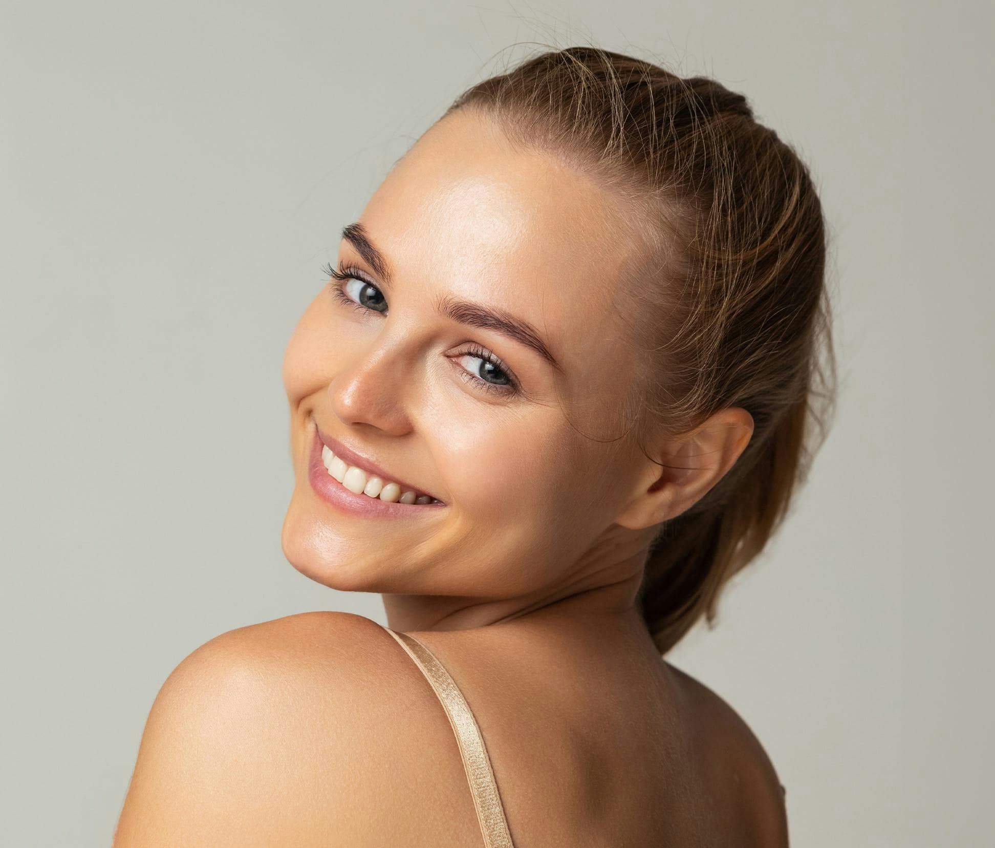 woman looking over her shoulder