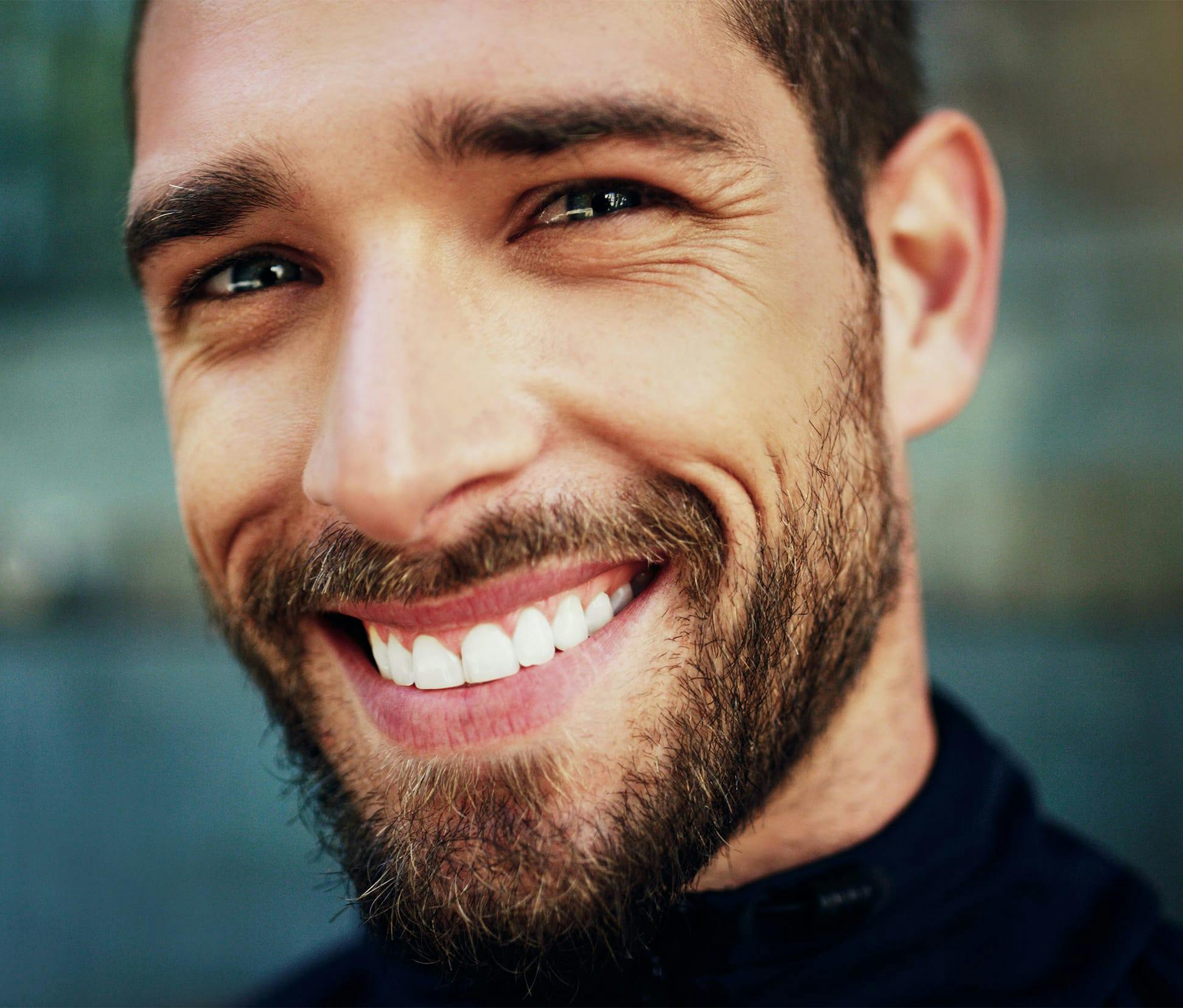 close up of man smiling