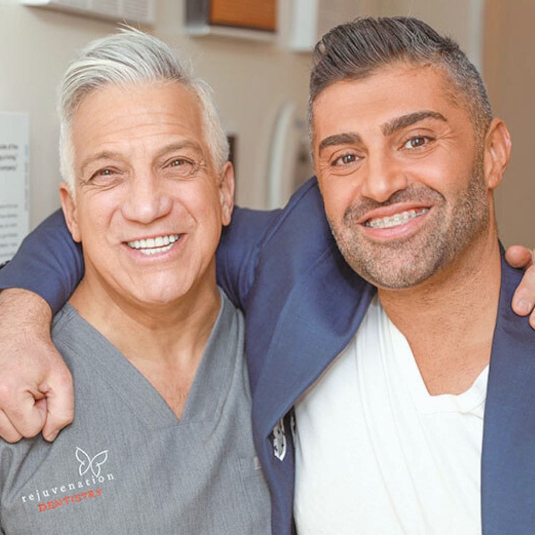 Dr. Curatola with man that has braces