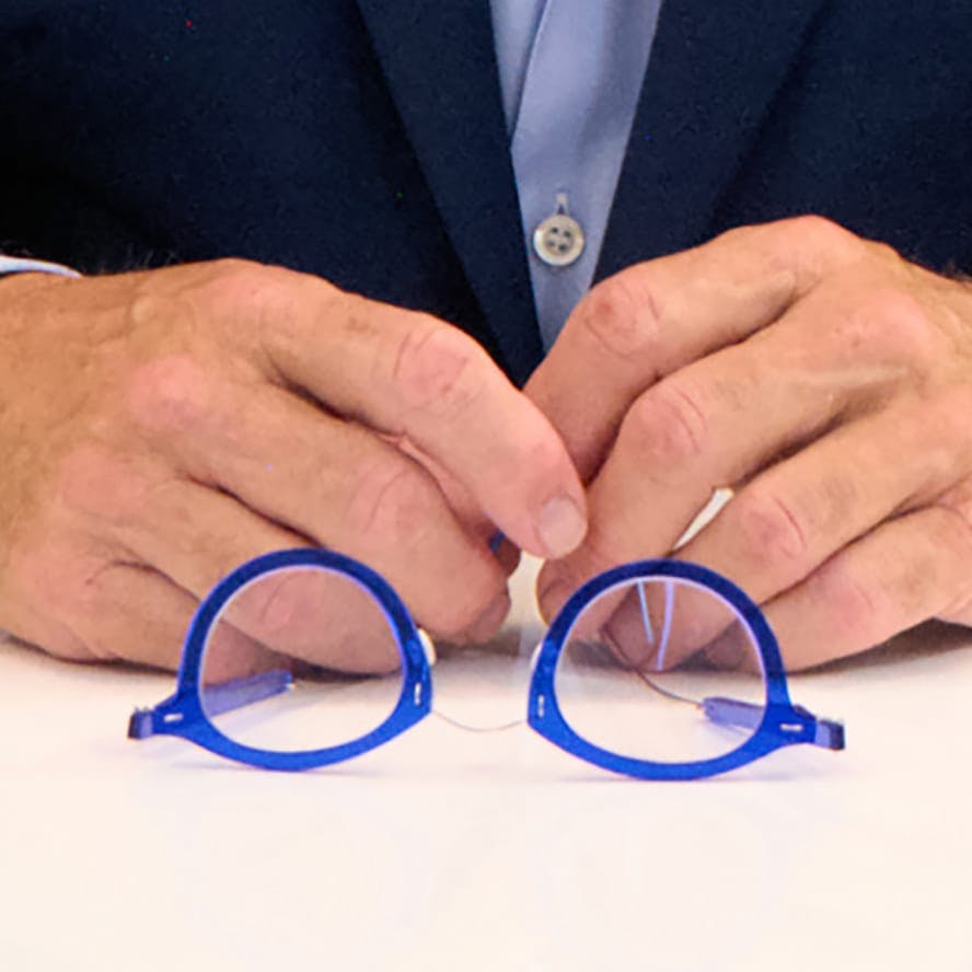 greyscale of glasses on the table