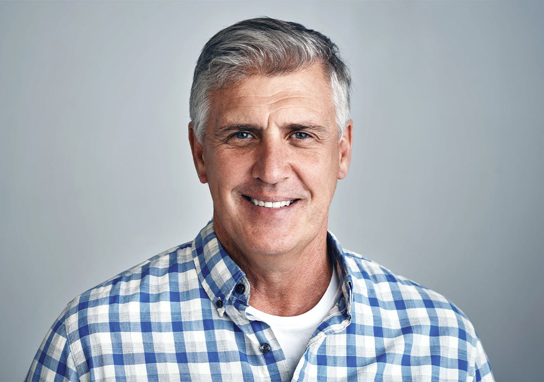 older man in a blue and white checkered shirt