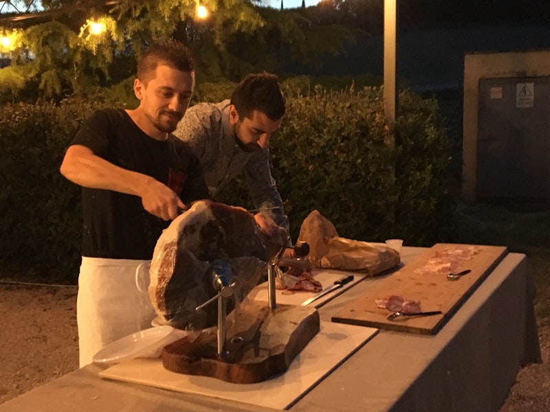 Stefano and David cutting ham The dinner