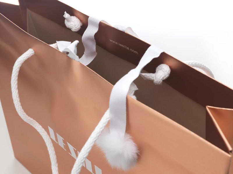 Shopping bag chiusura pon pon Shopping bag in carta lucida