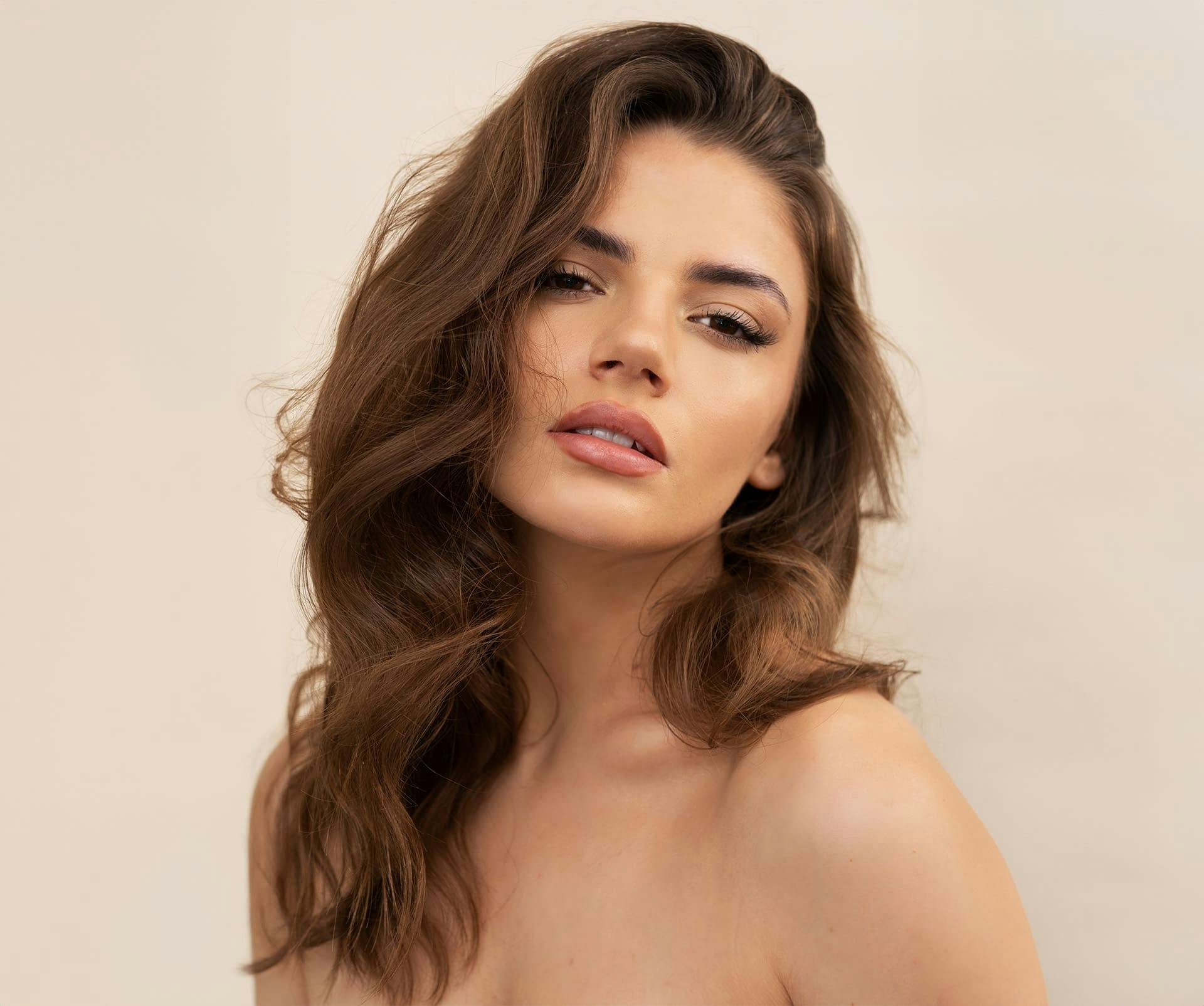 woman with wavy brunette hair