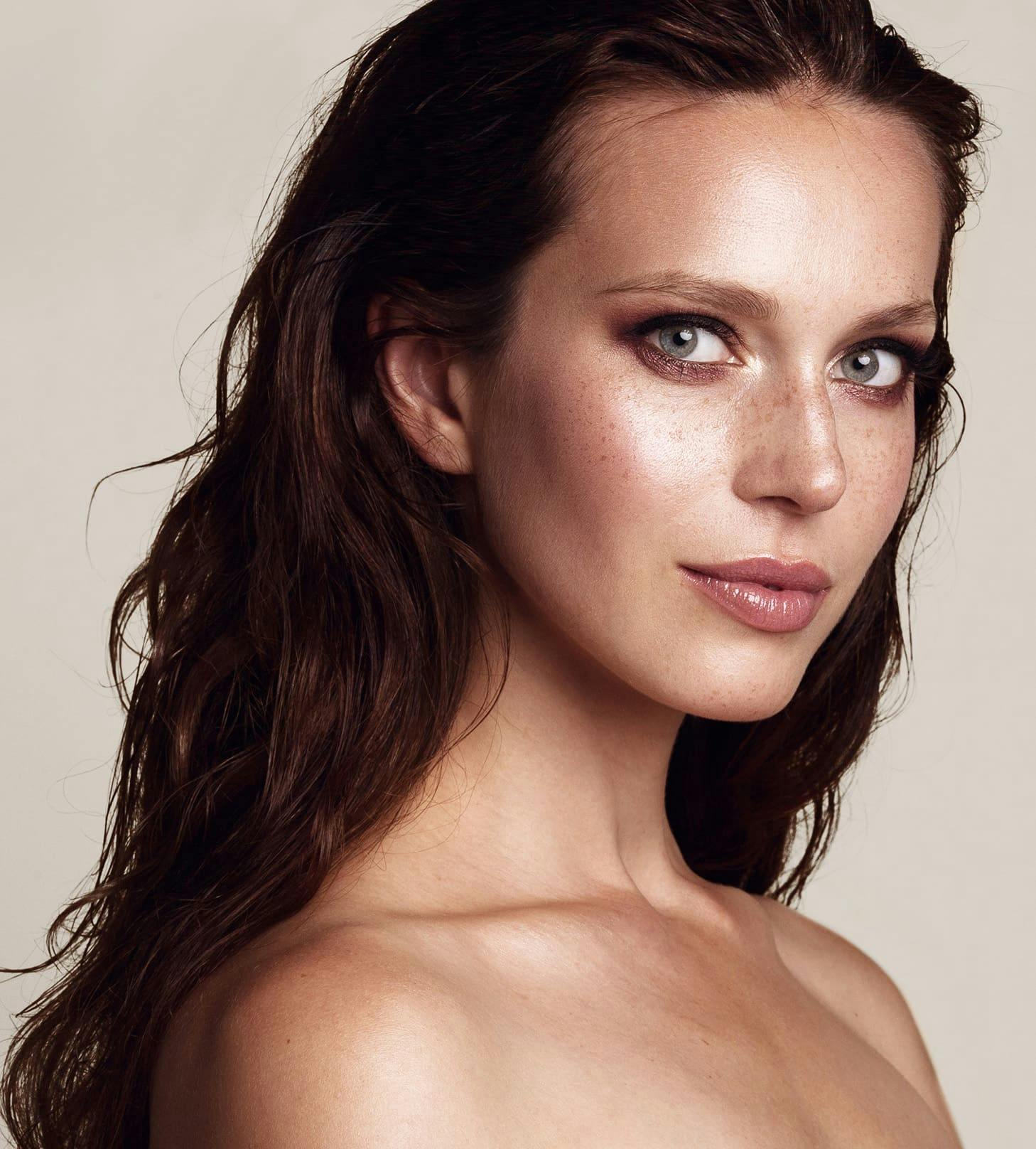woman with slick back hair