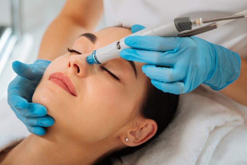 woman getting a face treatment