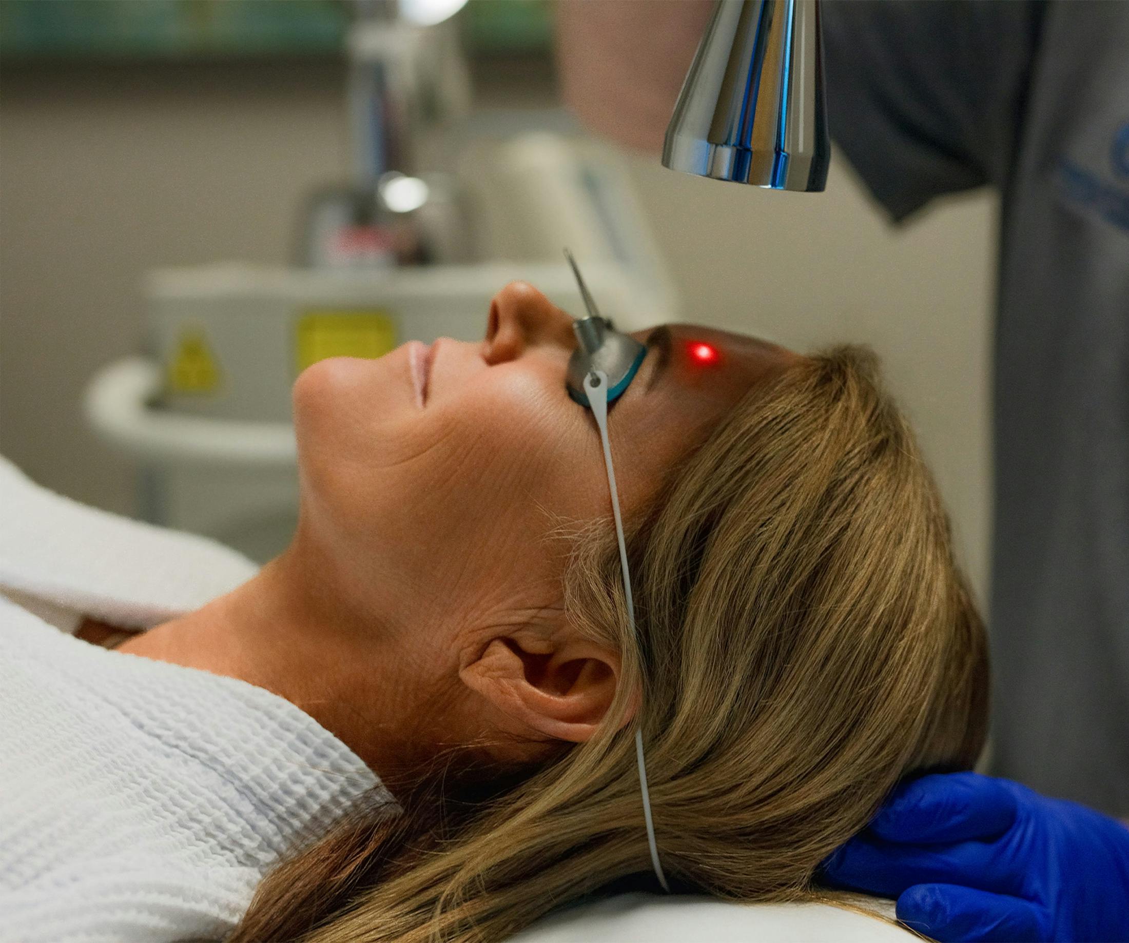 woman getting laser treatment