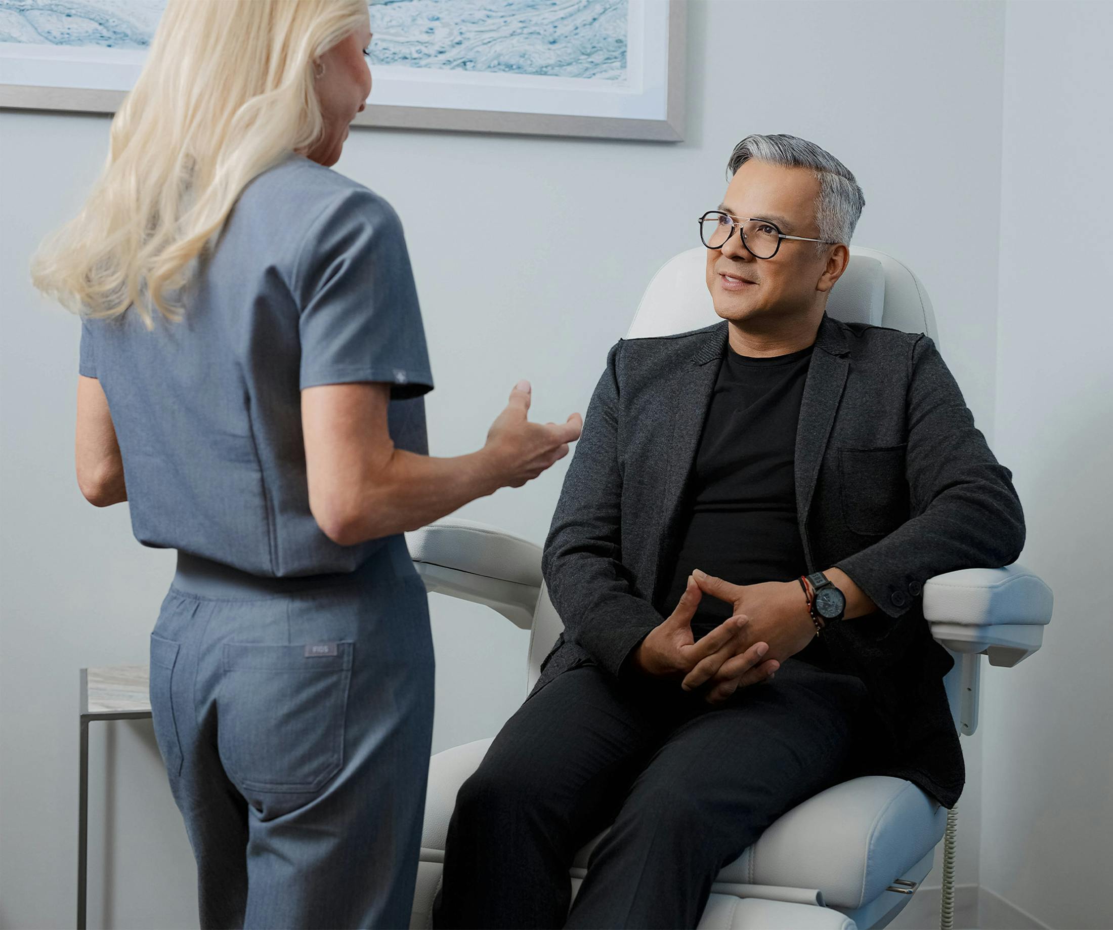 man sitting during consultation with doctor