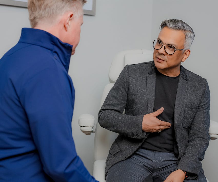 patient speaking with Dr Bryan Criswell