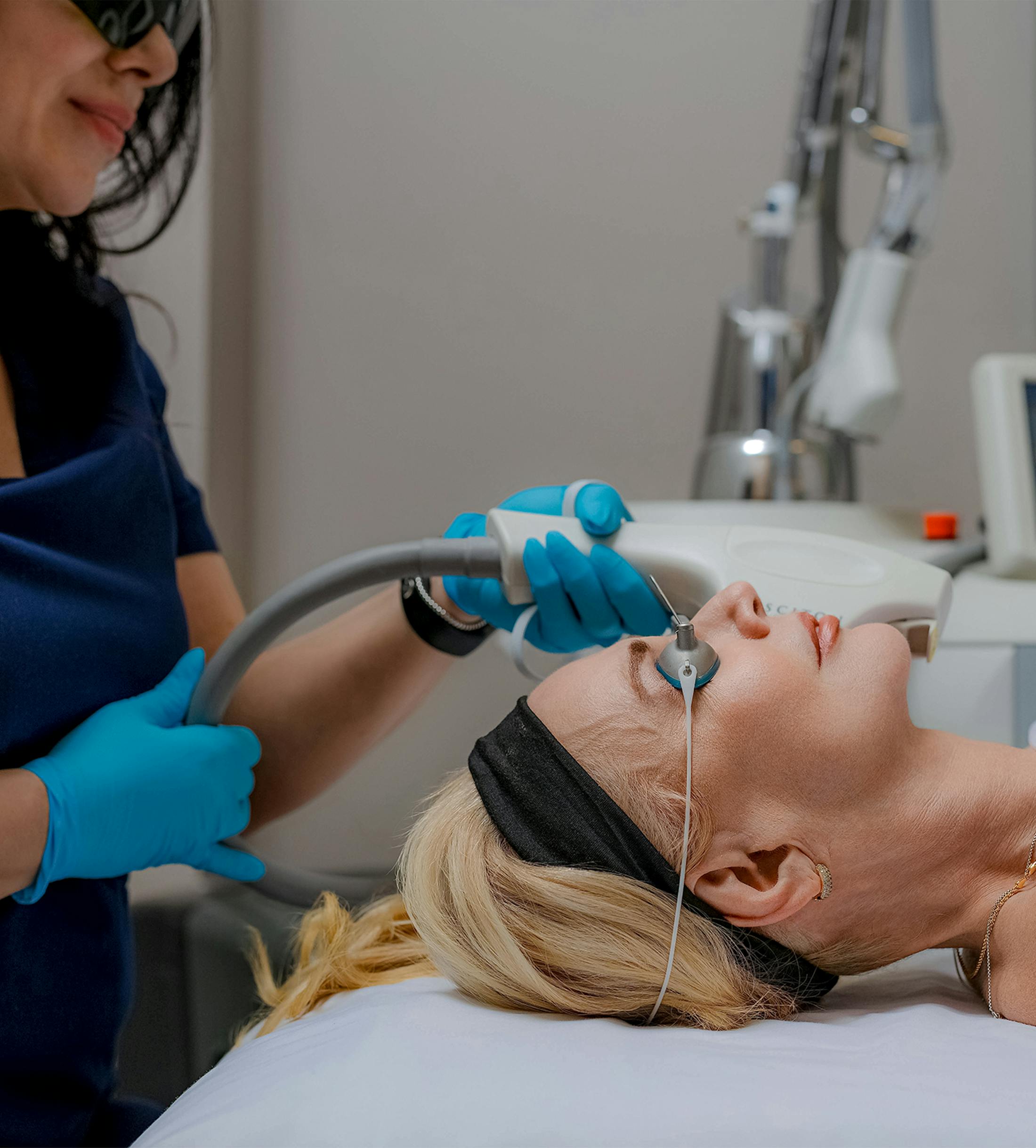 woman receiving laser treatment