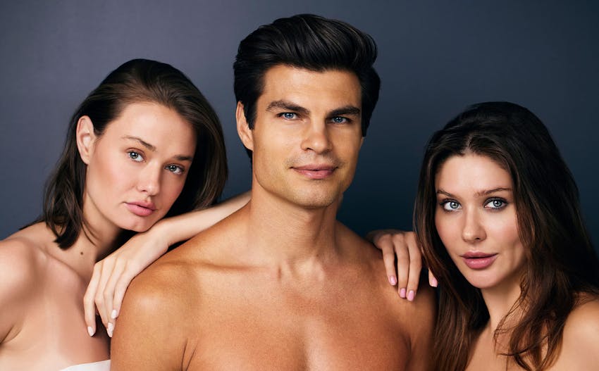 A man and two women