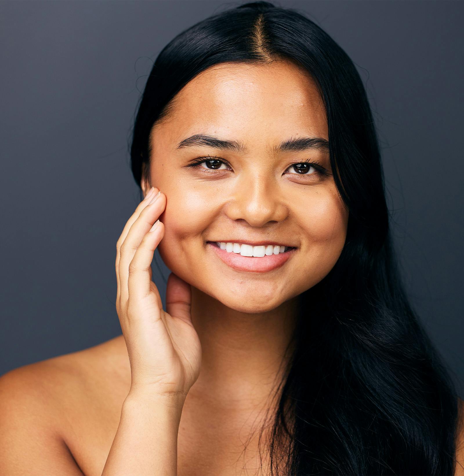 woman recieving an acne treatment from Studio MD provider