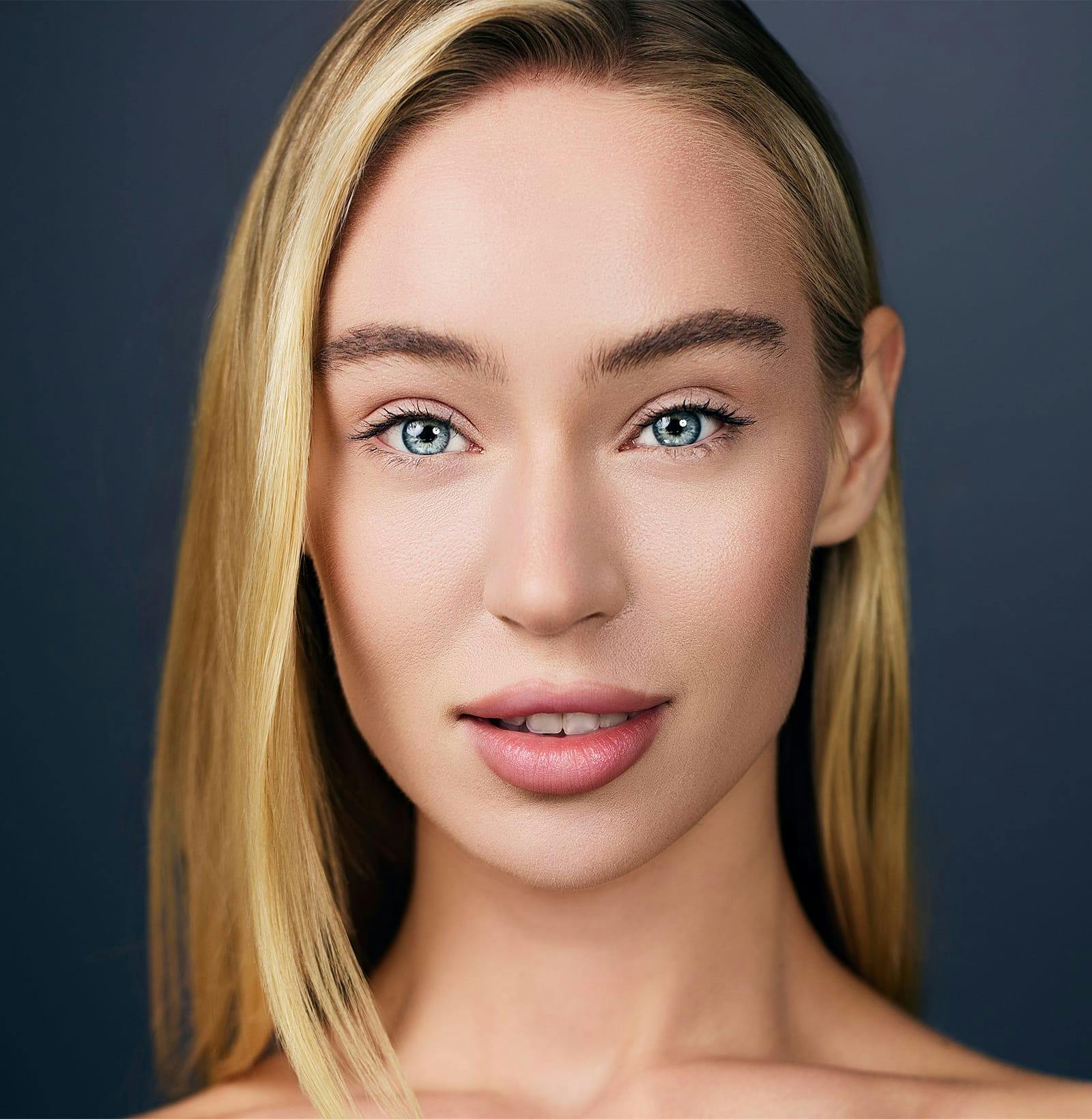 blonde woman looking forward