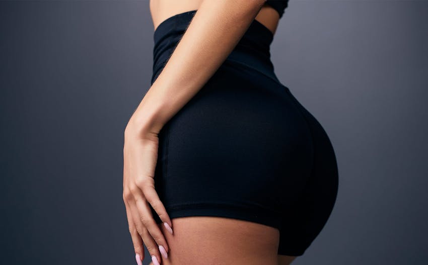 backside of woman in black shorts
