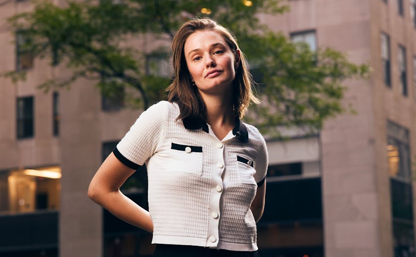 woman with arms stretched out parallel to her shoulders
