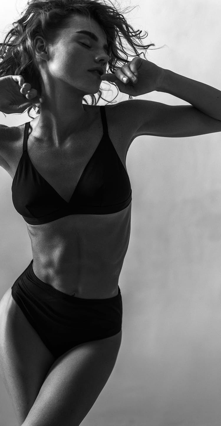woman in black undergarments