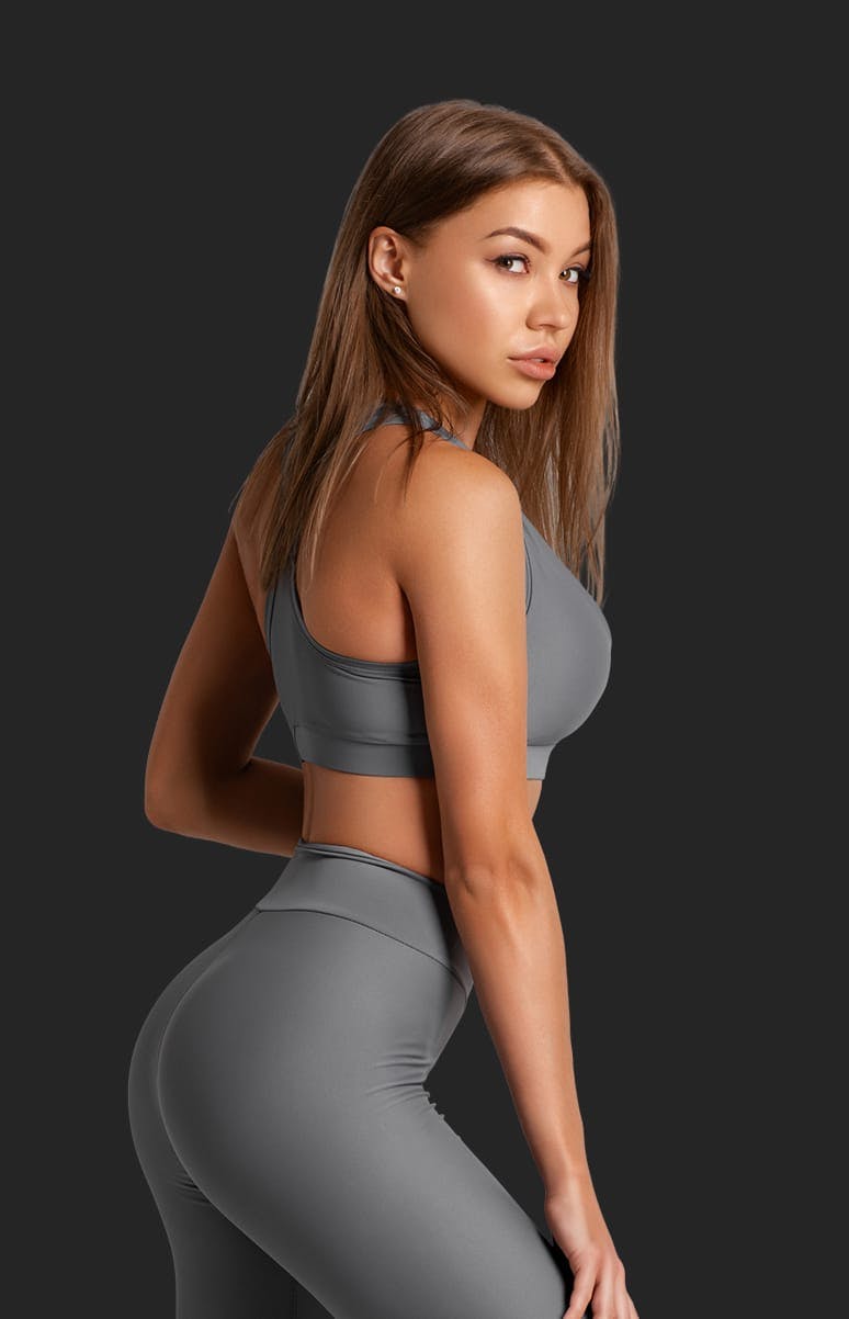 woman in grey workout attire