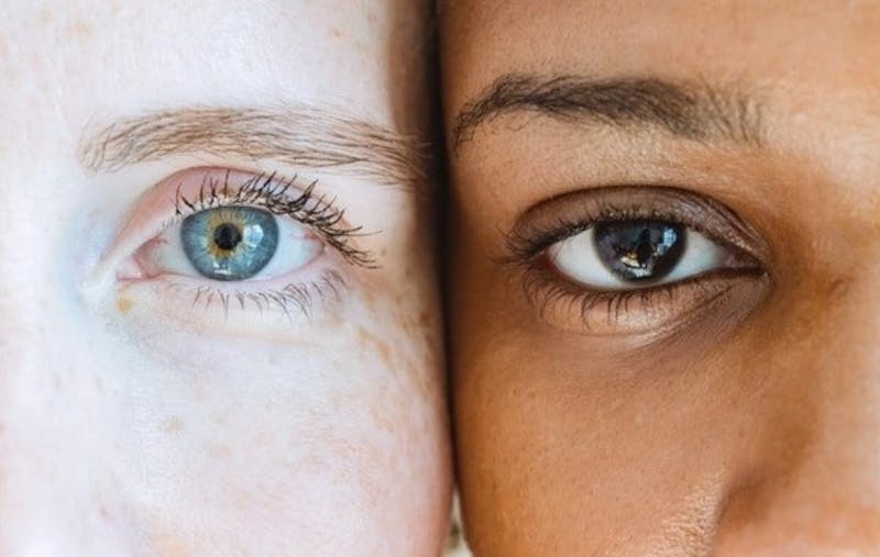 two women standing eye to eye