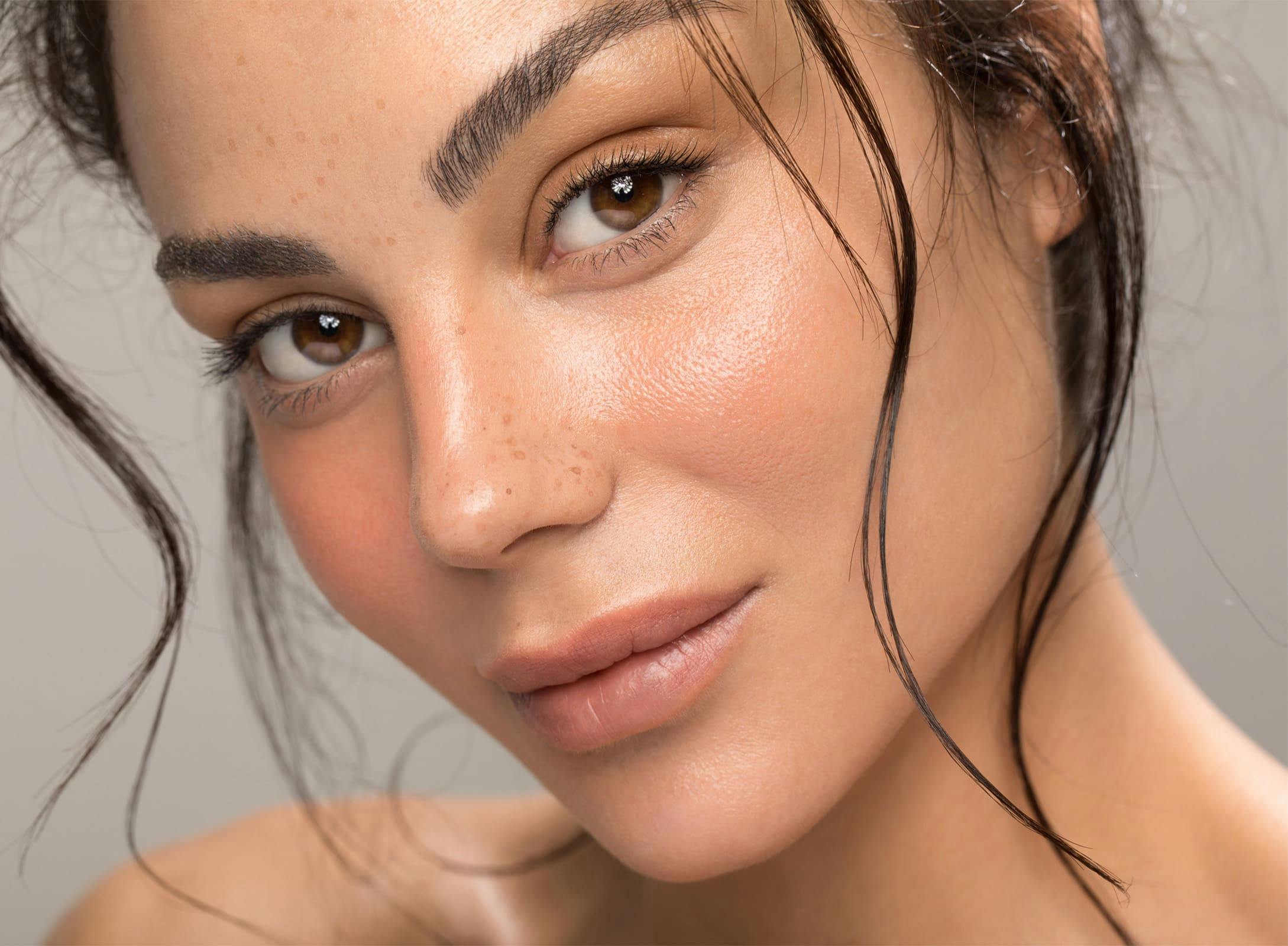 woman looking forward with hair strands around her face