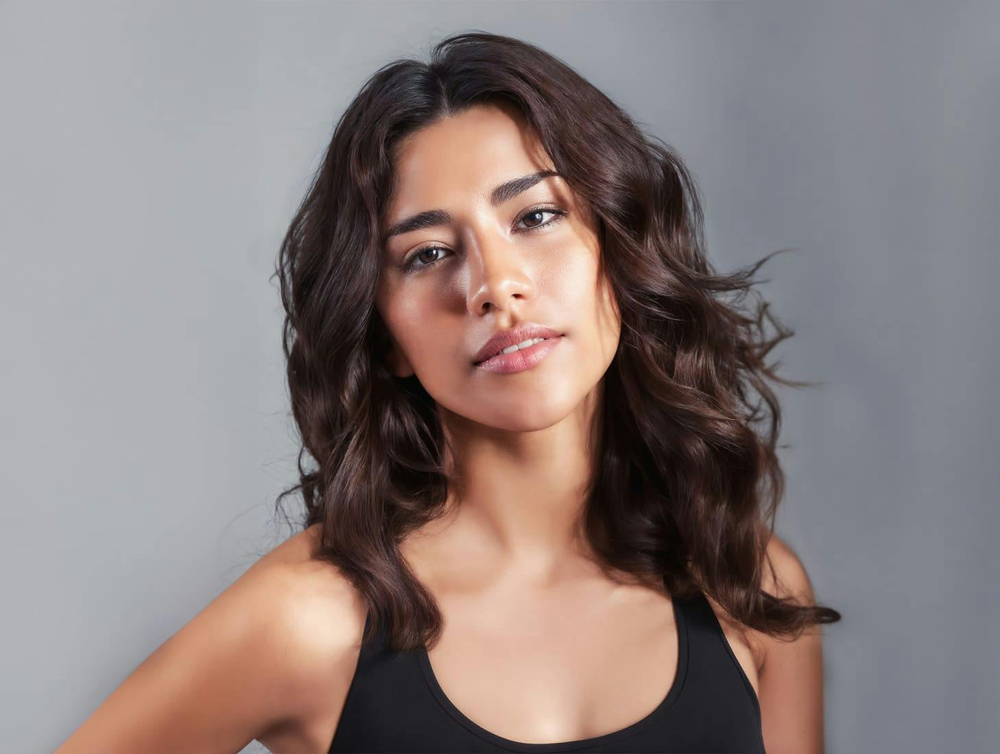 woman with wavy brunette hair