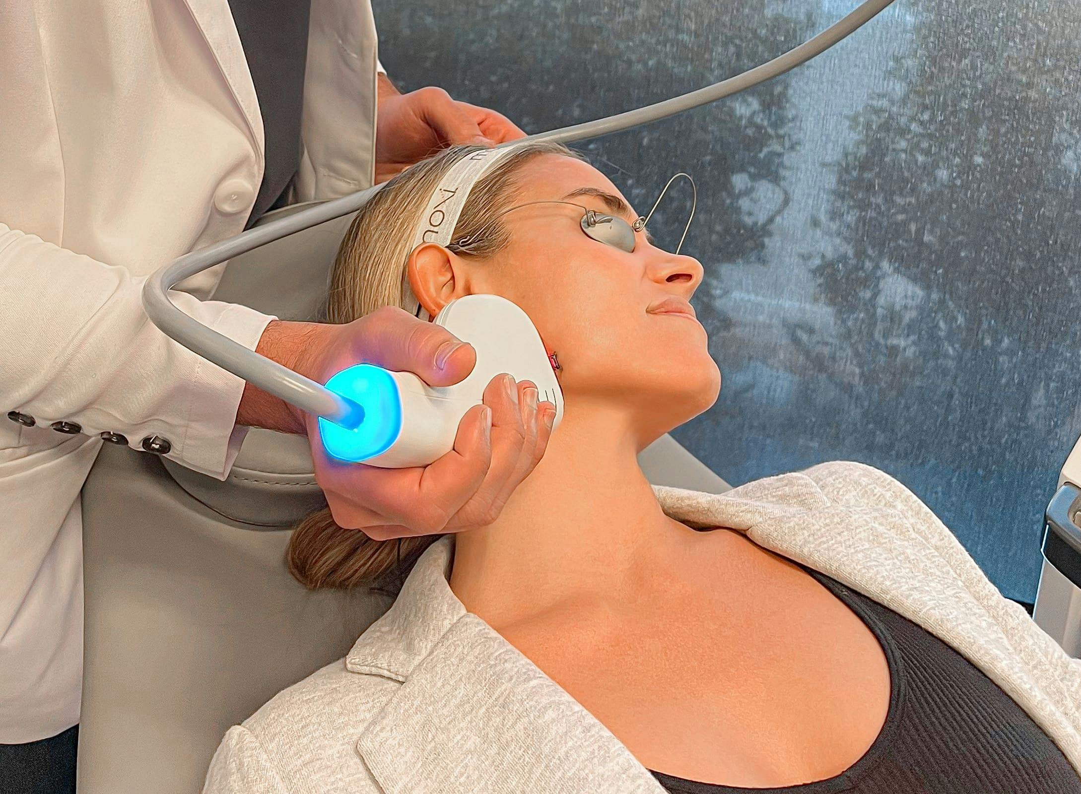 patient getting facial laser procedure