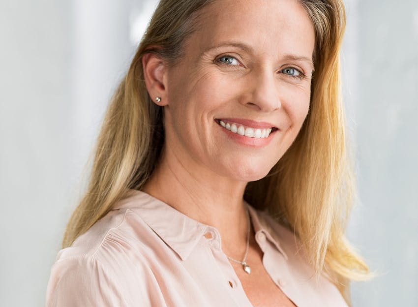 middle aged woman model with blonde hair