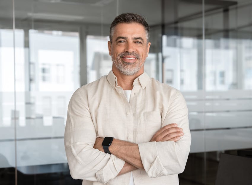 middle aged man model in a white linen shirt