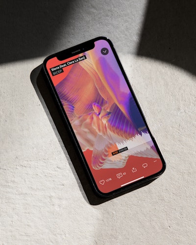 Phone On Surface with Bicep Artwork