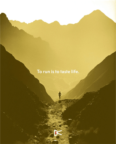 Photo of person running through valley with the text overlay "To run is to taste life."