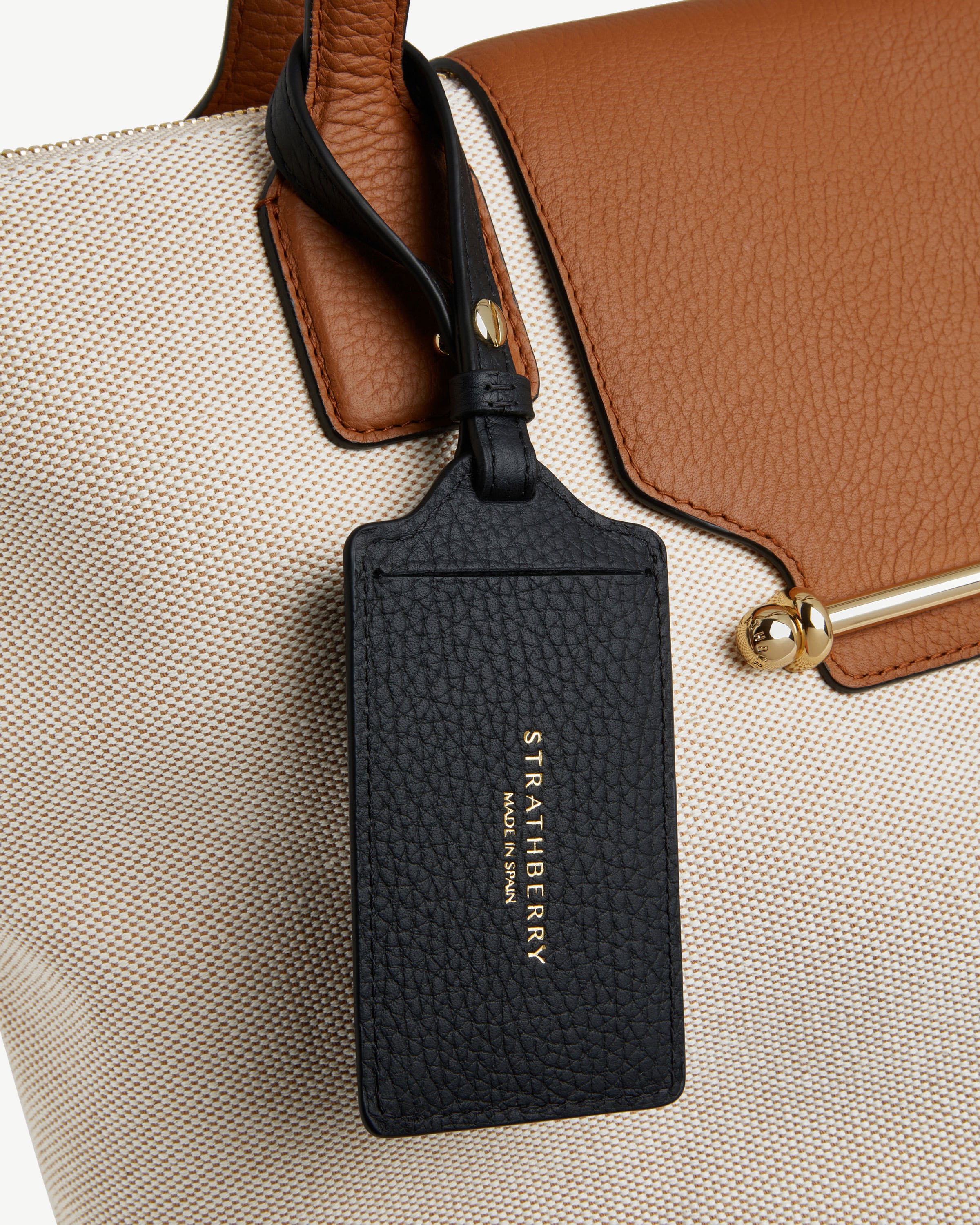 1756380696-strathberry-luggage