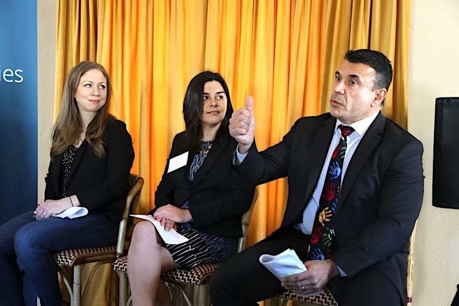the Director of the Health and Human Services (HHS), seen here with Chelsea Clinton