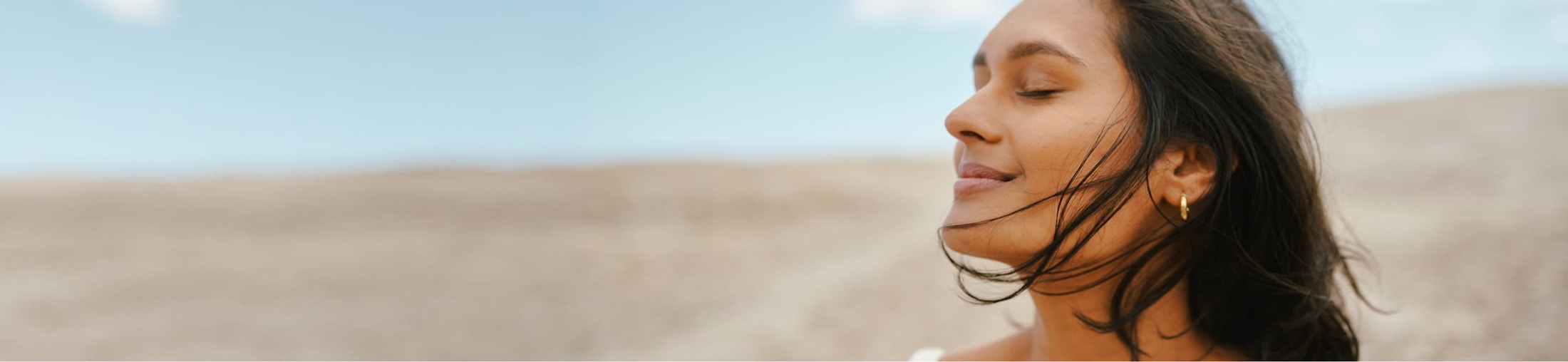 woman closing her eyes