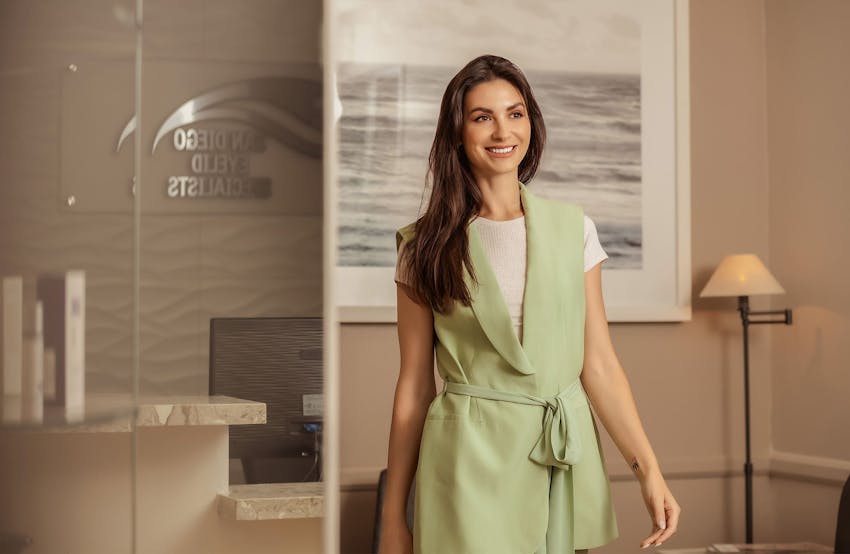 woman walking into a room