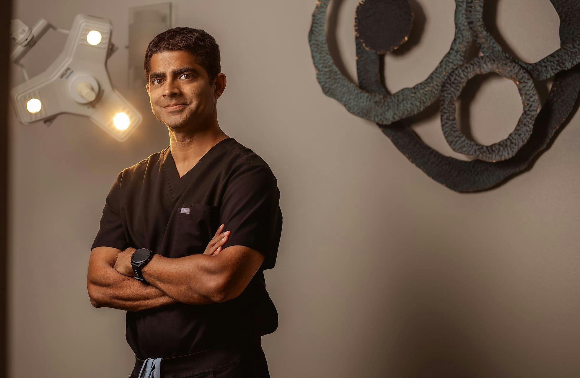 Dr. Iyengar crossing his arms