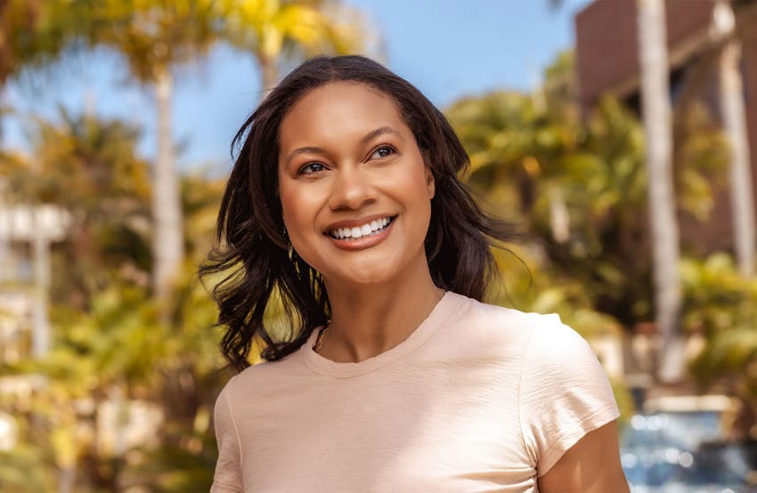 woman smiling outside