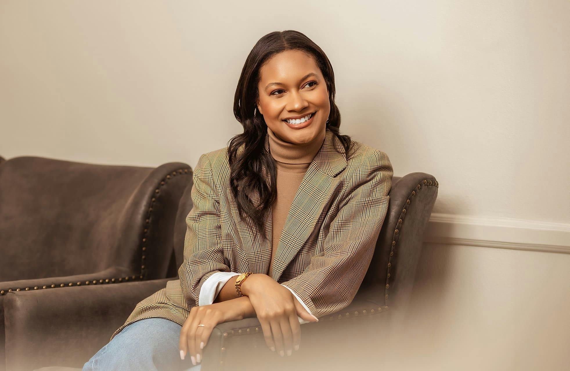 woman sitting down in seat