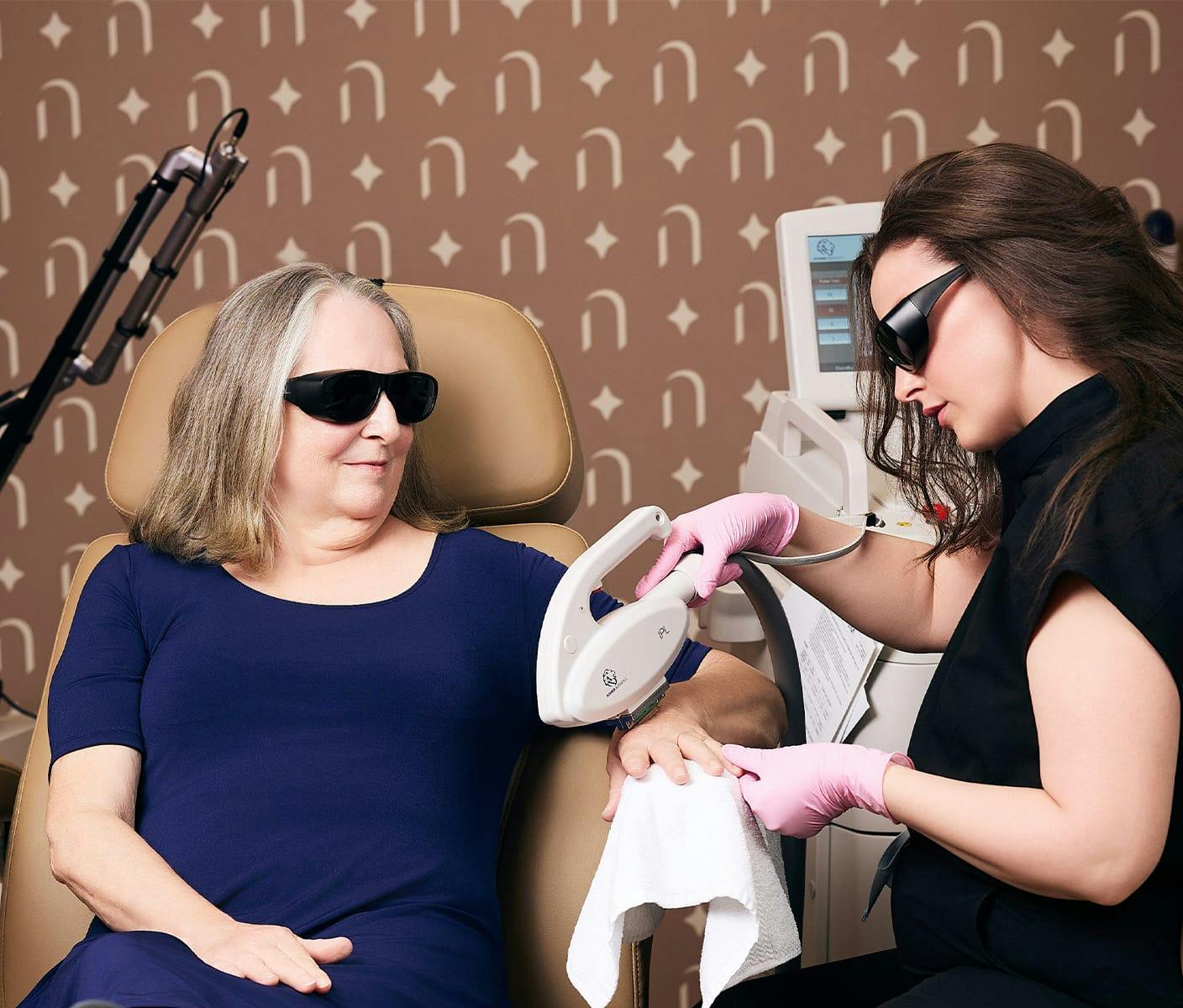 woman undergoing a hand rejuvenation treatment