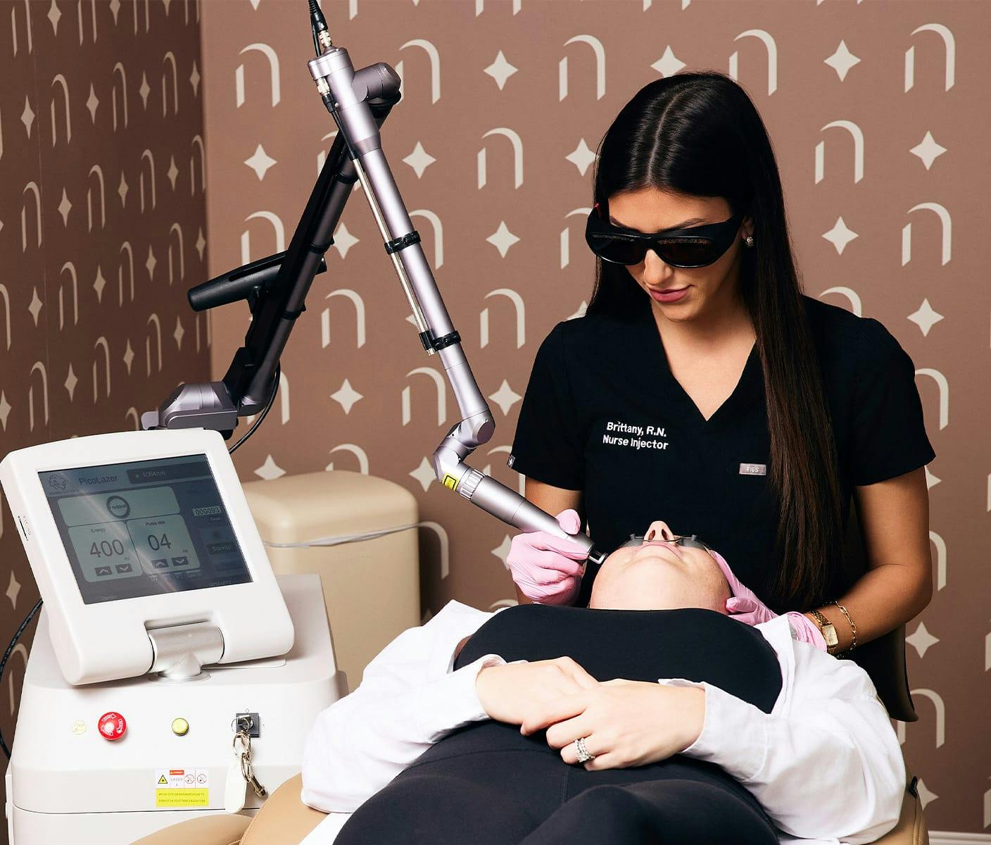 woman getting a pico laser treatment