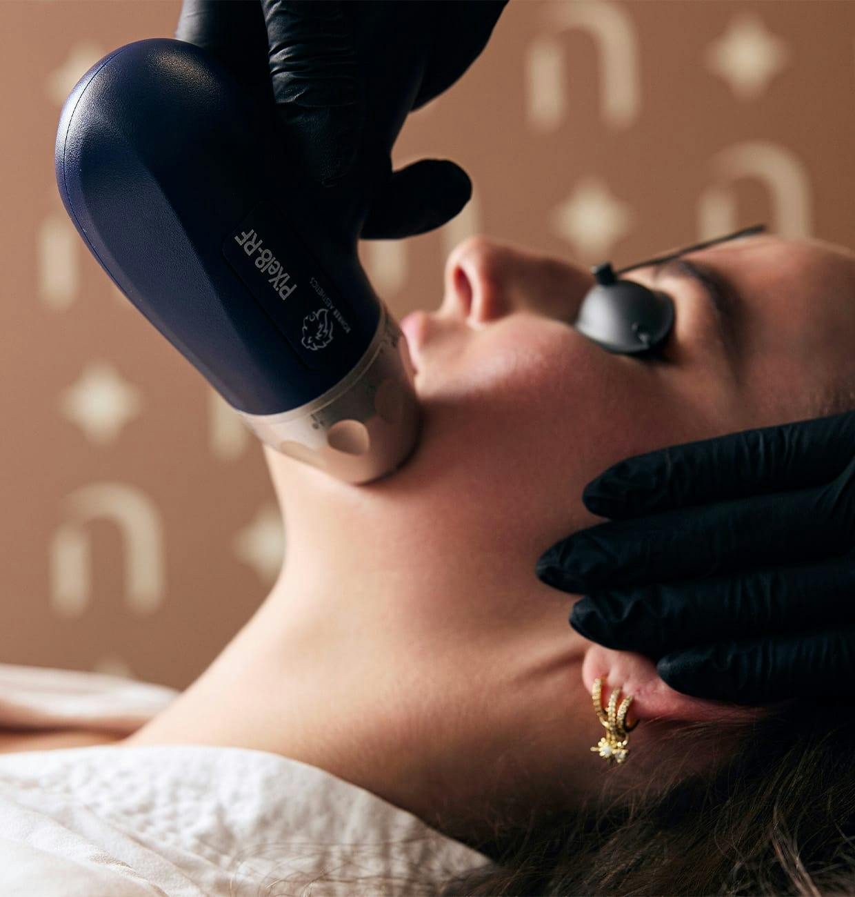 woman undergoing a face treatment