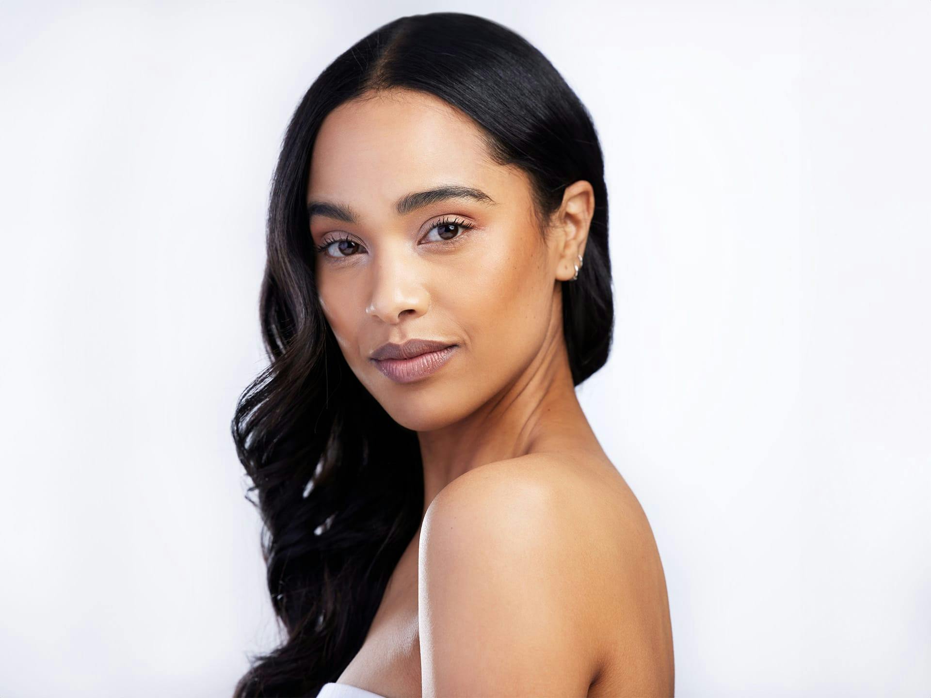 woman looking over her shoulder