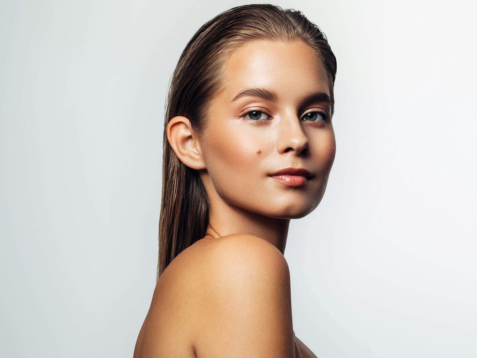 woman looking over her shoulder