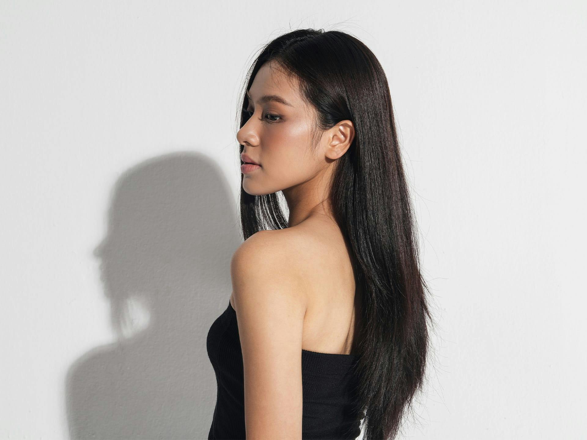 woman looking over her shoulder