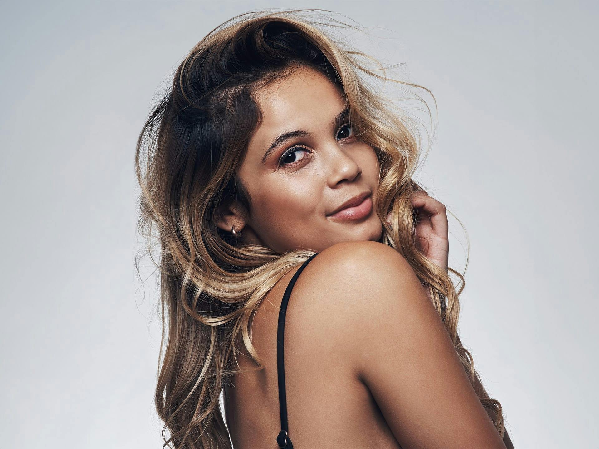 woman looking over her shoulder