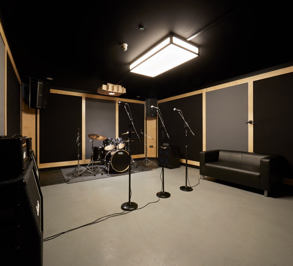 A typical rehearsal studio for solo drumming and band practice. Book a rehearsal room online by the hour today.