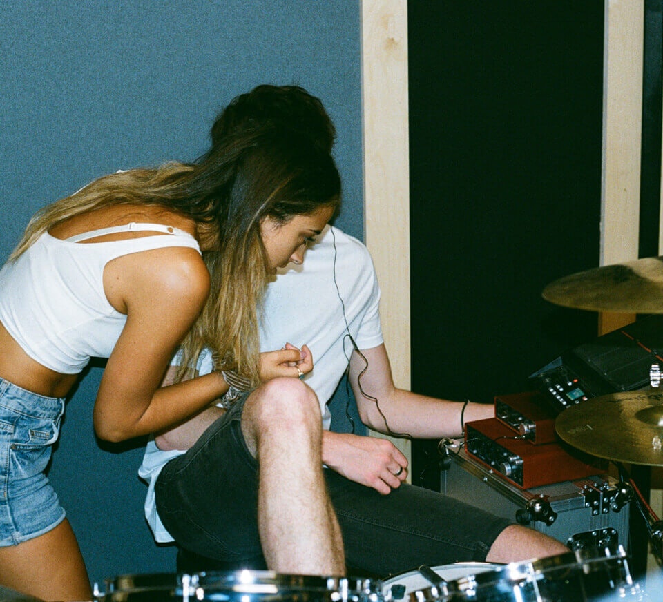 Band practice inside a typical Pirate rehearsal studio. Book a rehearsal room online by the hour today.